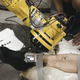 Illustration for article titled Car-Making Robot Arm Does Tattoos Now